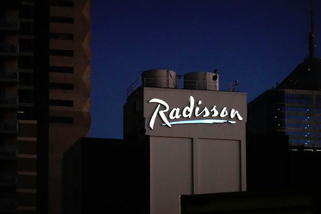 Radisson Rewards guide showing points, benefits, and membership tiers
