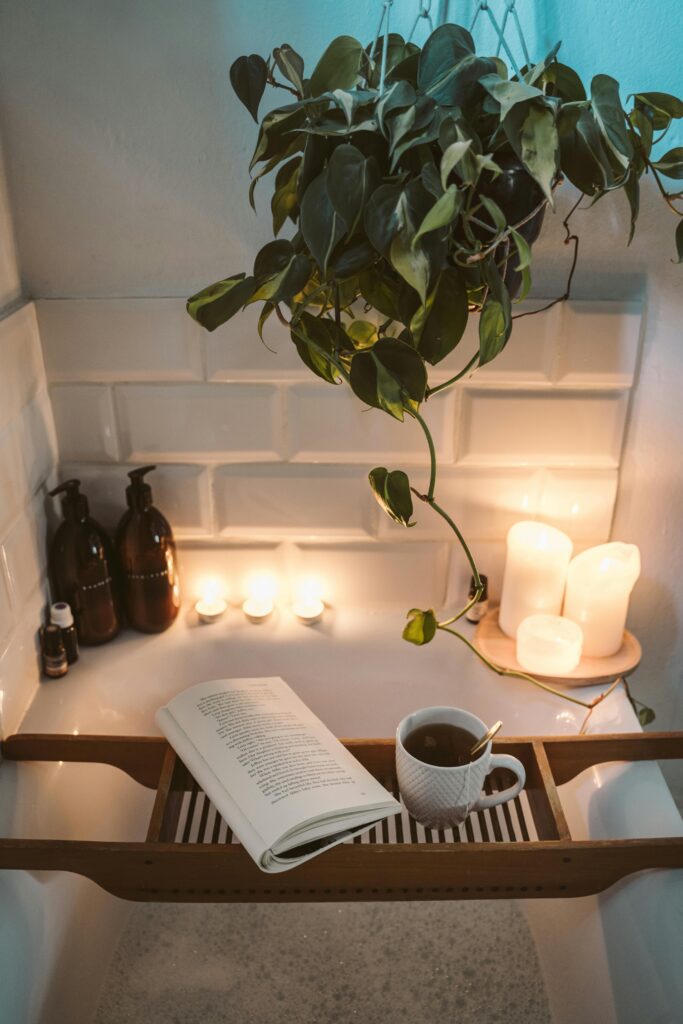 Modern hotel room with complimentary coffee, bottled water, and neatly arranged toiletries