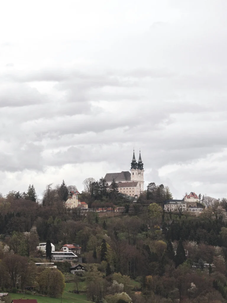 View of Pöstlingberg with its church and Linz cityscape in Austria