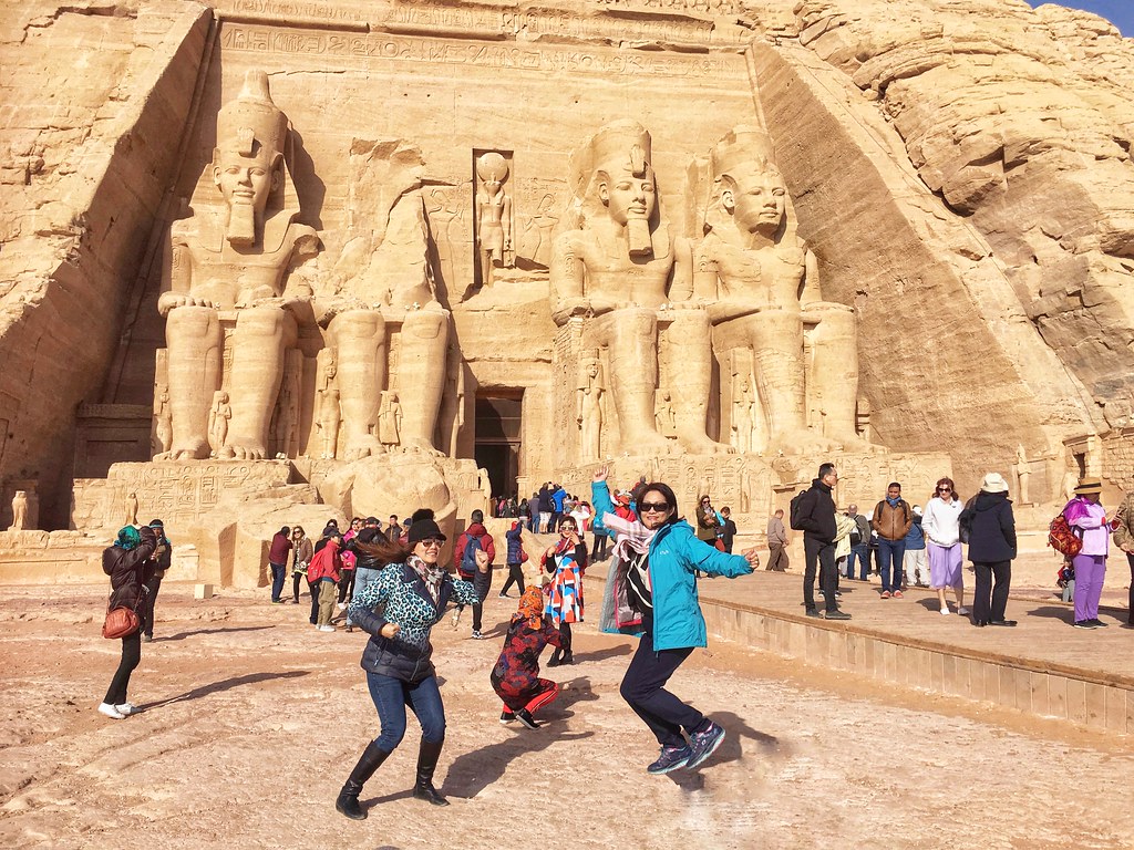 The stunning Philae Temple in Aswan surrounded by the Nile, showcasing ancient Egyptian architecture in this Egypt travel guide.