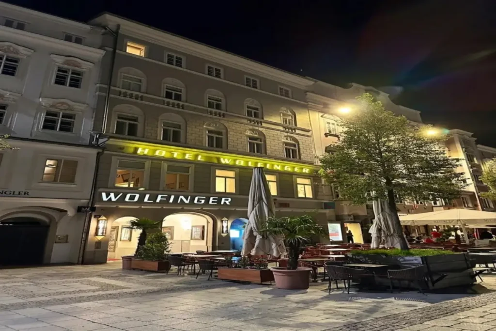 The traditional facade and exterior of Austria Classic Hotel Wolfinger on Hauptplatz in Linz Old Town.