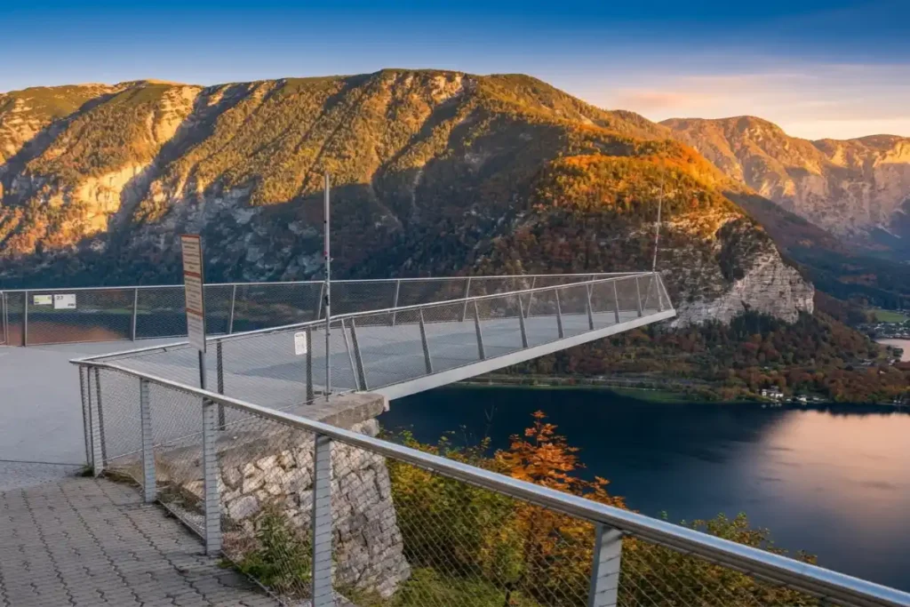 World Heritage Skywalk overlooking Hallstatt, Lake Hallstatt, and the surrounding alpine mountains.